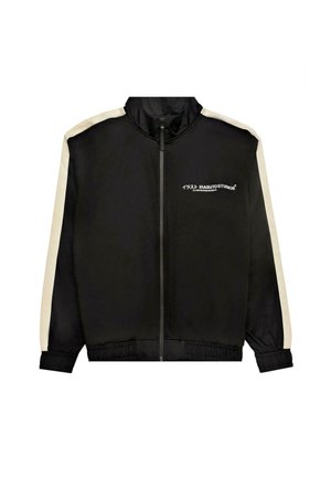 Czarna kurtka sportowa z kontrastującymi beżowymi panelami bocznymi, zamek błyskawiczny, wysoki kołnierz, elastyczne mankiety i ściągacz u dołu. Napis na przodzie.