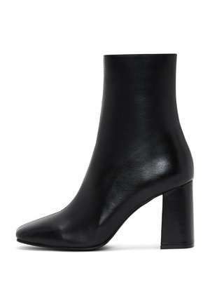 Black leather ankle boot with a pointed toe, a smooth texture, and a block heel, featuring a sleek and minimalist design.