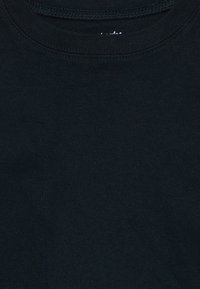 Black cotton t-shirt with a crew neck, featuring a smooth texture and fine ribbed detailing at the collar. Simple and solid design.