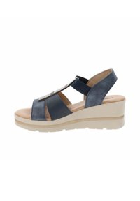 Sandali con zeppa in sintetico di colore blu navy, design con punta aperta, cinturini elastici e un accento metallico decorativo. Suola piattaforma di un leggero color beige.