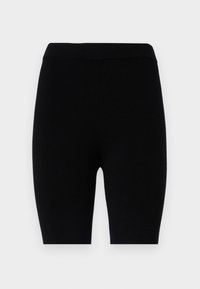 Leggings neri realizzati in tessuto elasticizzato, caratterizzati da un design semplice con una cintura elastica e un colore uniforme senza fantasie o dettagli.