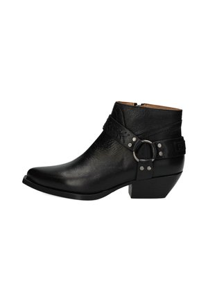 Black ankle boots made of textured leather with a pointed toe, silver hardware, a braided strap, and a stacked heel.