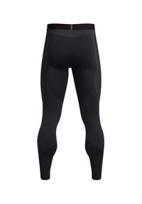 Leggings de sport noirs avec un design texturé, un tissu lisse et une ceinture à motif, ayant une forme ajustée et une finition brillante.
