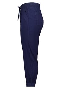 Pantalons de jogger bleu marine en tissu léger, avec une taille élastique, des cordons de serrage, des poches latérales et des poignets fuselés.