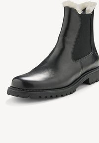 Schwarze Leder-Stiefel mit elastischen Seitenpaneelen, Schaffellfutter und robustem Gummisohlen, mit schmaler Zehenpartie und strukturiertem Finish.