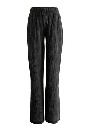 Loose black crinkled fabric pants with elastic waistband and adjustable drawstring, straight leg fit.