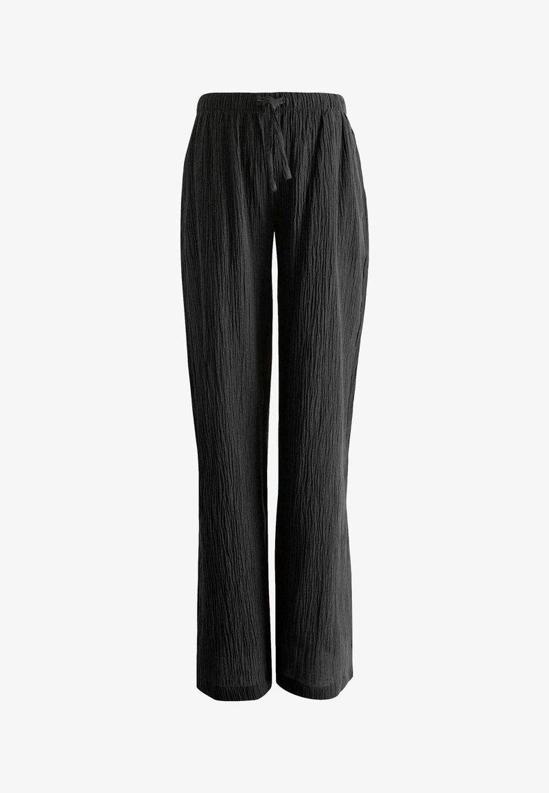 Pantalon ample en tissu noir froissé avec taille élastique et cordon de serrage ajustable, coupe droite.
