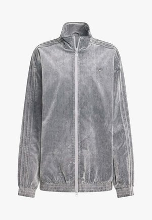 Giacca grigia in velluto con zip, collo alto, polsini ed orlo elastici e dettagli sottili a tre strisce lungo le maniche.