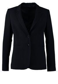 Blazer noir en tissu sur mesure, avec un col cranté, une fermeture à un bouton et deux poches avant. Texture lisse, coupe ajustée.