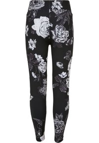 Blomstrede leggings i svart med hvite og grå rose mønstre. Laget av elastisk materiale, med høyt liv og tettsittende design.