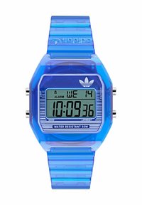 Digitalna ura z modrim prozornim plastičnim ohišjem in naramnicami. LCD zaslon prikazuje čas in dan. Značilnosti vključujejo alarm in vodoodpornost do 50 m.