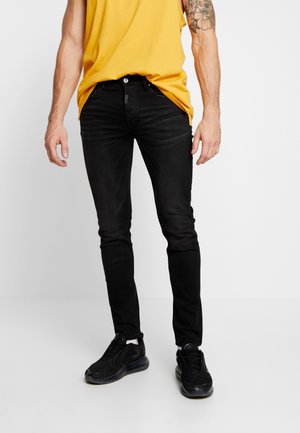 Tigha Vaqueros pitillo - black