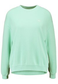 Sudadera de gran tamaño en verde claro, con mangas largas, puños acanalados, cuello redondo y un sutil logo de la marca cerca del escote. Textura suave.