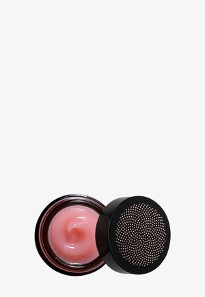 Black jar with a textured lid, containing light pink cream. The jar has a glossy finish and a rounded shape.