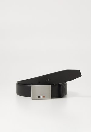 Black leather belt with a rectangular silver metal buckle featuring a logo and three color accents: white, black, and brown.