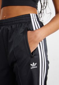 adidas Originals PANTS - Calças de fato de treino - black