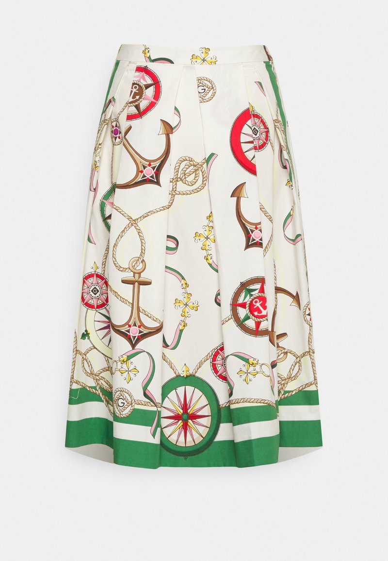 Jupe plissée blanche avec un imprimé nautique comportant des ancres, des compas et des cordes. Ourlet vert avec des couleurs d'accent rouge et rose.