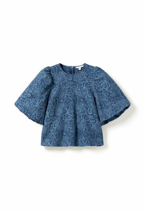 Sinistä kukkakuosista tekstuurikangasta oleva pusero, jossa on pyöreä pääntie ja liehuvat hihat, takana vetoketjusuljenta.