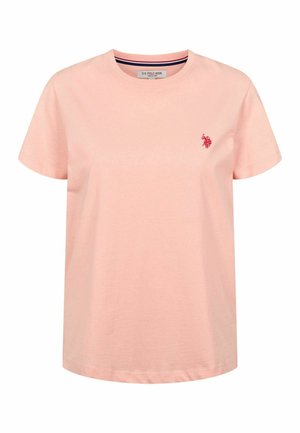 Svetloružové tričko s krátkymi rukávmi a okrúhlym výstrihom, s malým červeným vyšívaným logom hráča polo na ľavej strane hrude.