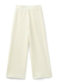 Spodnie szerokie w kolorze kremowym z bawełnianej tkaniny, charakteryzujące się gładką teksturą i elastycznym paskiem w talii, z widocznymi szwami wzdłuż szwów.