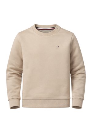 Felpa beige con girocollo, polsini e orlo a costine, piccolo logo Tommy Hilfiger sul petto e sul lato, e dettaglio con bottone vicino alla spalla sinistra.