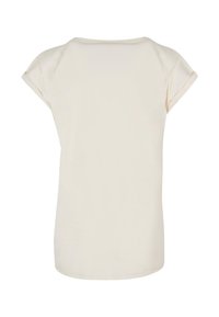 Lyst beige kortærmet top med rund halsudskæring og afslappet pasform. Blødt, glat stof med en subtil glans. Ingen synlige mønstre eller detaljer.