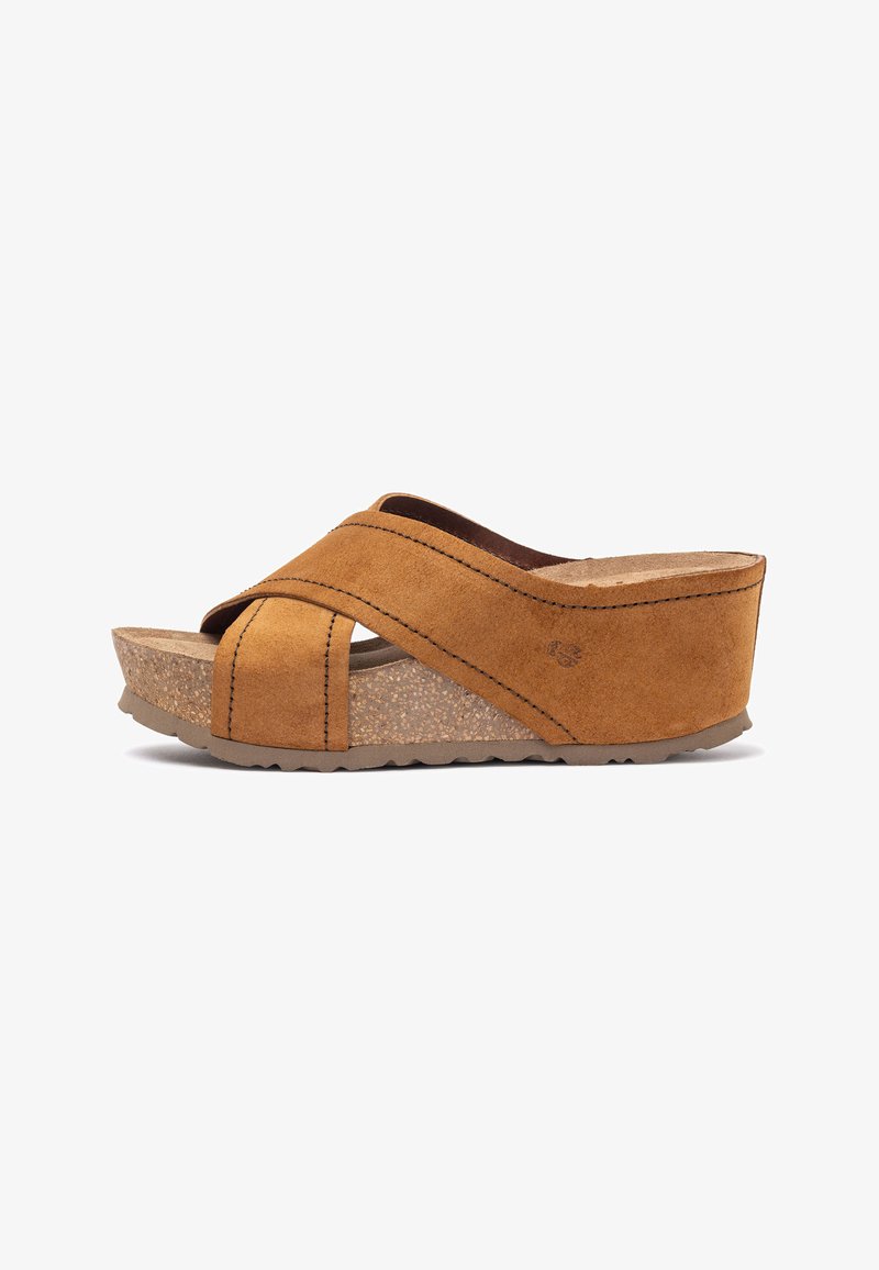 Bruine suède wedgesandalen met kruisbanden, een gestructureerde kurken zool en rubberen loopvlak. Kenmerken zijn gestikte details en een semi-open ontwerp.