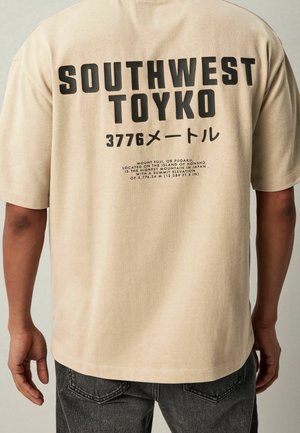 Print T-shirt - beige