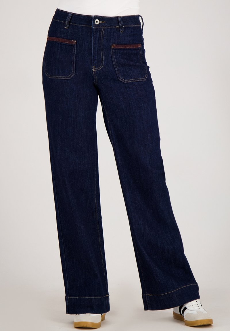 Donkerblauwe ruime jeans gemaakt van denim, met twee voortassen met bruine accenten, een hoge taille en een rechte snit.