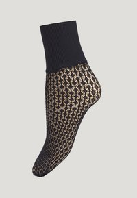 Sort ankelstrømpe i mesh med ribbet top, åben vævning med geometrisk mønster og en pasform, der følger fodens form.