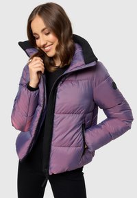 Puffer jacket in iridescent purple and black, featuring a high collar, zippered pockets, and a quilted design with a shiny texture.