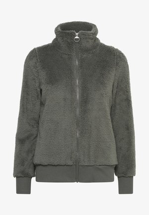 Veste verte foncée duveteuse avec un col montant, une fermeture éclair intégrale, des poignets côtelés et une taille côtelée. Texture douce avec un aspect soyeux tout au long.