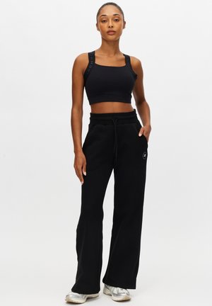 BASE WIDE - Pantalones deportivos - black