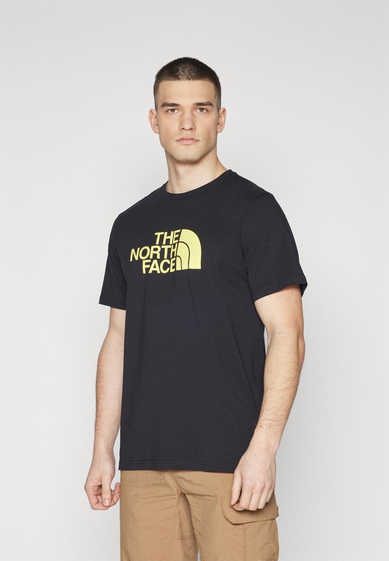The North Face EASY TEE - Camiseta estampada - black/sun yellow