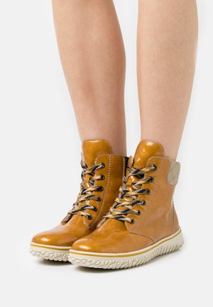 Rieker Schnürstiefelette - miele/beige