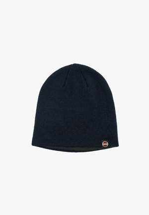 Cappello beanie lavorato a maglia di colore blu navy con una texture a coste e un piccolo logo Colmar sul lato. Design semplice e attillato.