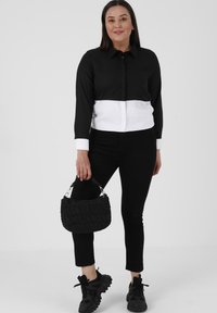 Modanisa Vaqueros slim fit - black