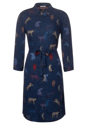 Robe bleu marine longueur genou avec manches longues, col, ceinture à la taille et motif léopard et tigre multicolore.