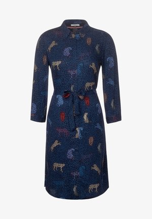 Marineblå knælængde kjole med lange ærmer, krave, taljebånd og flerfarvet leopard- og tigerprint.