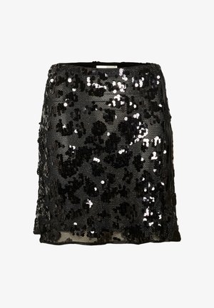 Mustmustriidist seelik, millel on sobiv disain, millel on tekstureeritud pind, kus on üksteise peale kattuvate erineva suurusega mustrite äärised ja sirge serv.