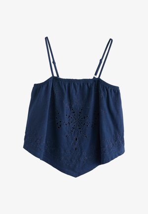 Crop top sans manches bleu marine avec bretelles fines réglables et broderie florale ajourée sur le devant et l'ourlet.