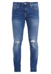 Modré džíny z denimu s úzkým střihem, s jemným vyblednutím a velkými roztrženími na kolenou. Standardní design s 5 kapsami a zapínáním na kovový knoflík.