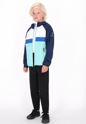 Schmuddelwedda, SCHMUDDELWEDDA ANORAK UNISEX - Könnyű dzseki - türkis colorblock