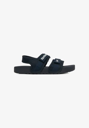 Sandalo nero Reebok con due cinturini in velcro regolabili e suola imbottita, progettato per comfort e uso casual.