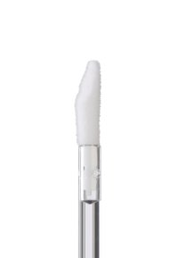 Applicatore in silicone bianco con punta sopra un manico in plastica trasparente; setole affusolate e textured per un'applicazione precisa.
