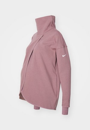Vaaleanpunainen pitkähihainen äitiysasu, jossa korkea kaulus ja kaareva edessä oleva aukko sekä valkoinen Nike-logo hihassa.