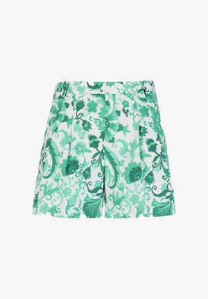 Pantalones cortos blancos de talle alto y pinzas, con un estampado integral de flores y hojas verdes.