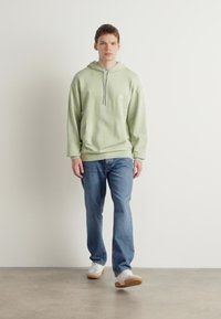 HUGO NOTTYO - Felpa - light pastel green
