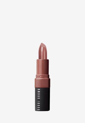 Lippenstift in matter Ausführung, mit einer sanften braunen Farbe. Die Mine hat eine abgerundete Spitze und ist in einem schwarzen Röhrchen mit weißer Beschriftung untergebracht.