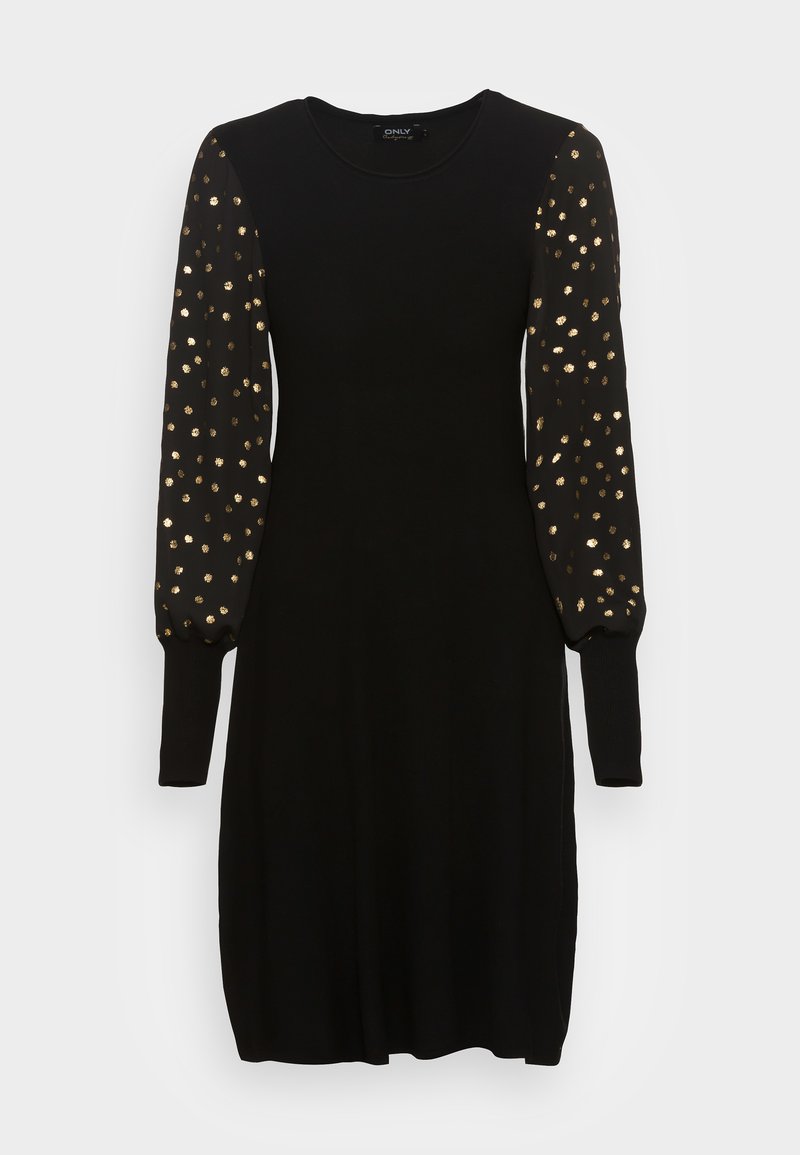 Melnas kleitas ar garām pūkainām piedurknēm, kas rotātas ar zelta punktiņiem. Izgatavota no mīksta auduma, ar apaļu izgriezumu un brīvu griezumu.